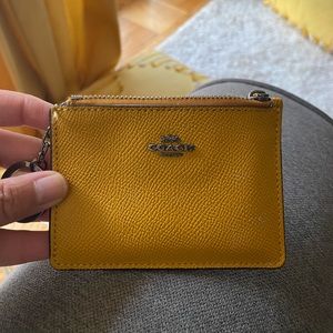 Coach card holder in a beautiful mustard color!